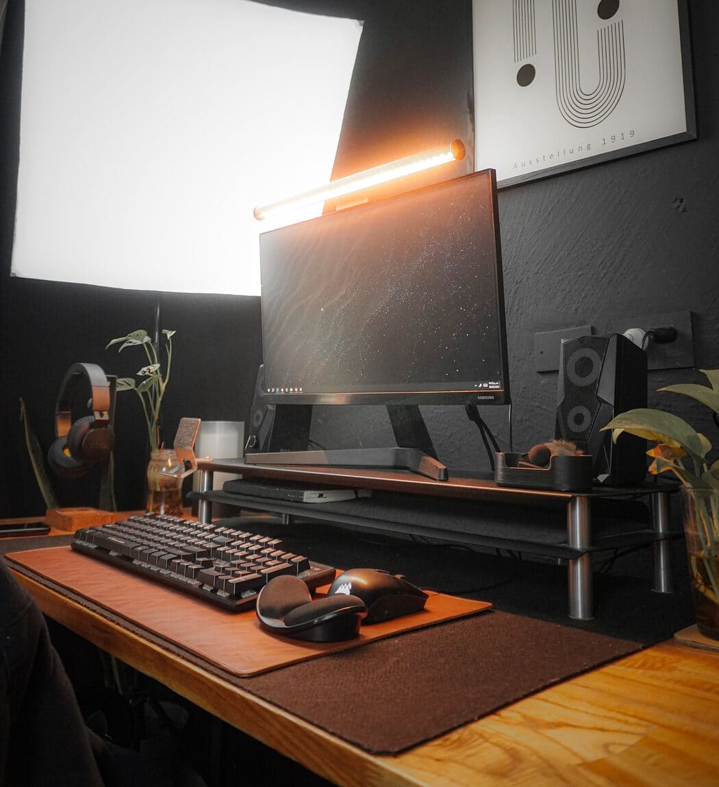 A desk lit by the Striva Light Bar