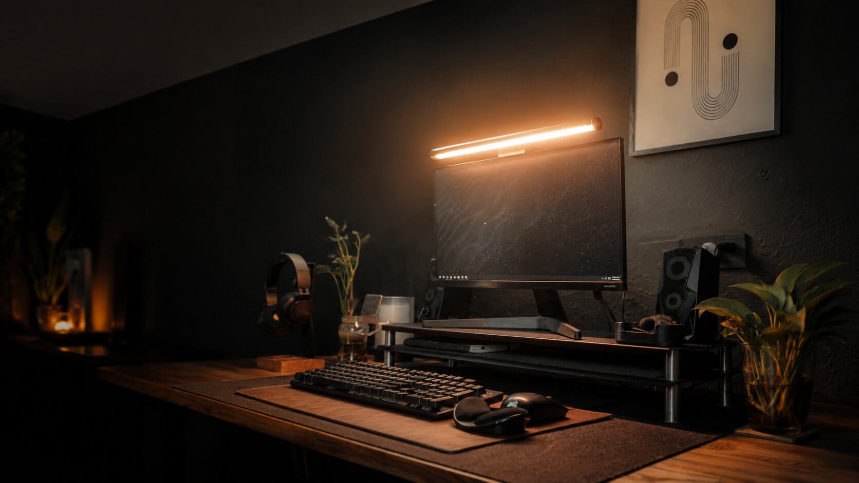 A desk lit by the Striva Light Bar